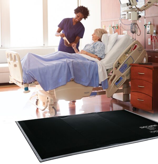 SBEV-1W Bedside Safety Floor Mat for elderly fall injury prevention. Hospital Nurse With Digital Tablet Talks To Senior Patient